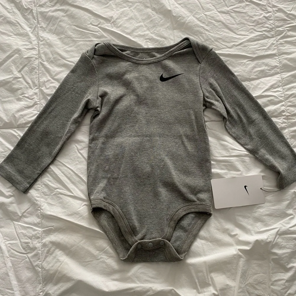 Nike Gray Long Sleeve Baby Onesie